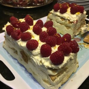 Lemon layer slice with raspberries